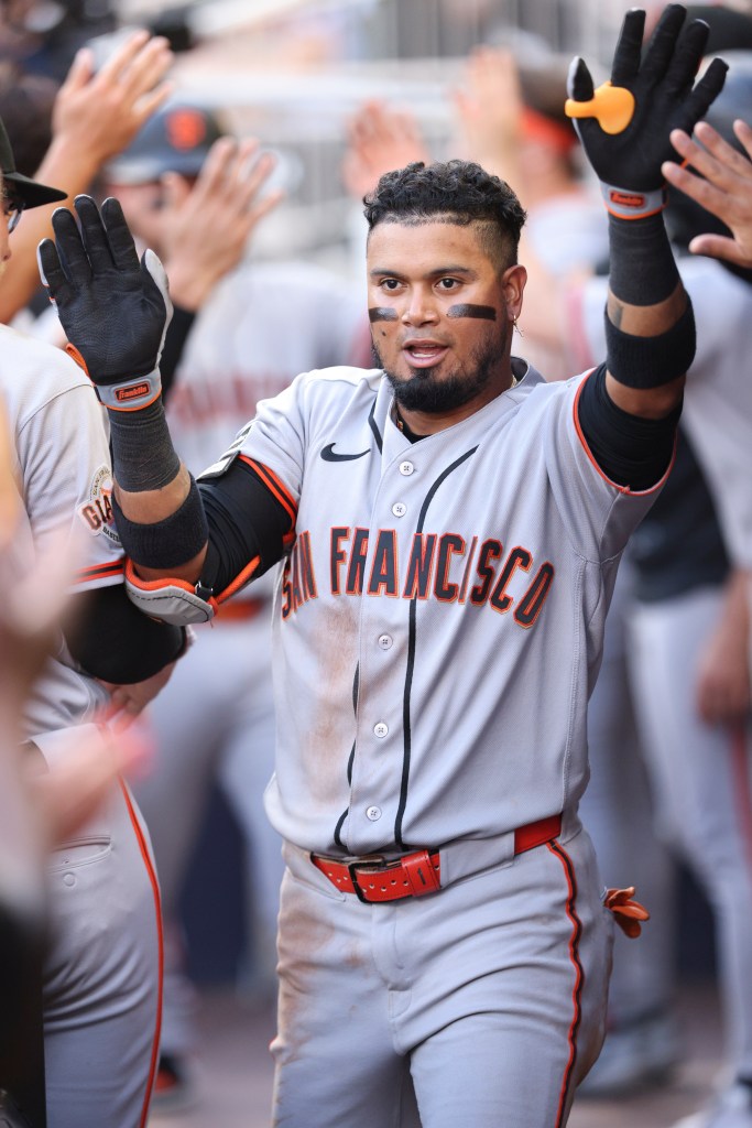 Luis Arraez #1 of the San Francisco Giants celebrates during a game.