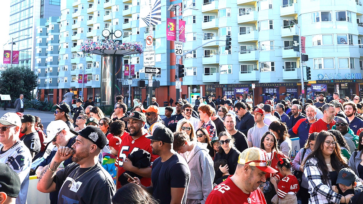 NFL fans walking outside the Super Bowl Experience at the Moscone Center in San Francisco