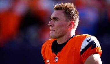 Denver Broncos quarterback Bo Nix warms up before a game against the Green Bay Packers.