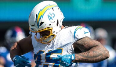 Sep 28, 2025; East Rutherford, New Jersey, USA; Los Angeles Chargers linebacker Tuli Tuipulotu (45) celebrates after a defensive stop during the first half against the New York Giants at MetLife Stadium. Mandatory Credit: Vincent Carchietta-Imagn Images