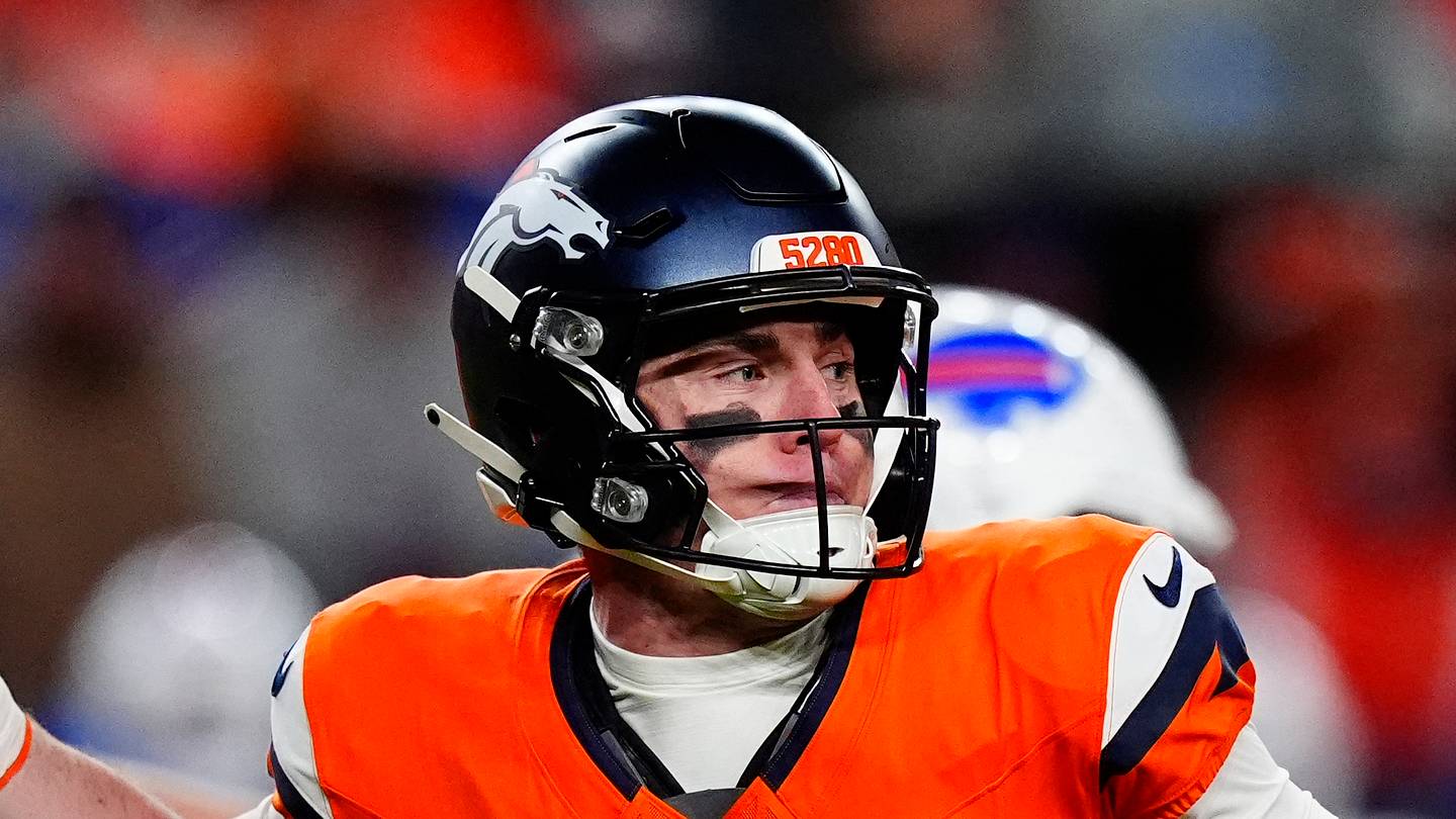 Jan 17, 2026; Denver, CO, USA; Denver Broncos quarterback Bo Nix (10) throws during the fourth quarter of an AFC Divisional Round playoff game against the Buffalo Bills at Empower Field at Mile High. Mandatory Credit: Ron Chenoy-Imagn Images