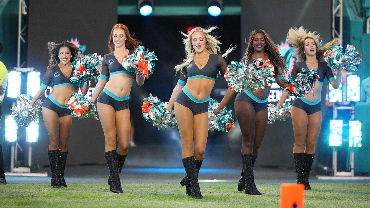 Dolphins cheerleaders reveal new uniforms as rivalry with Cowboys ramps up, Romo DUI memes & Vrabel's puppy