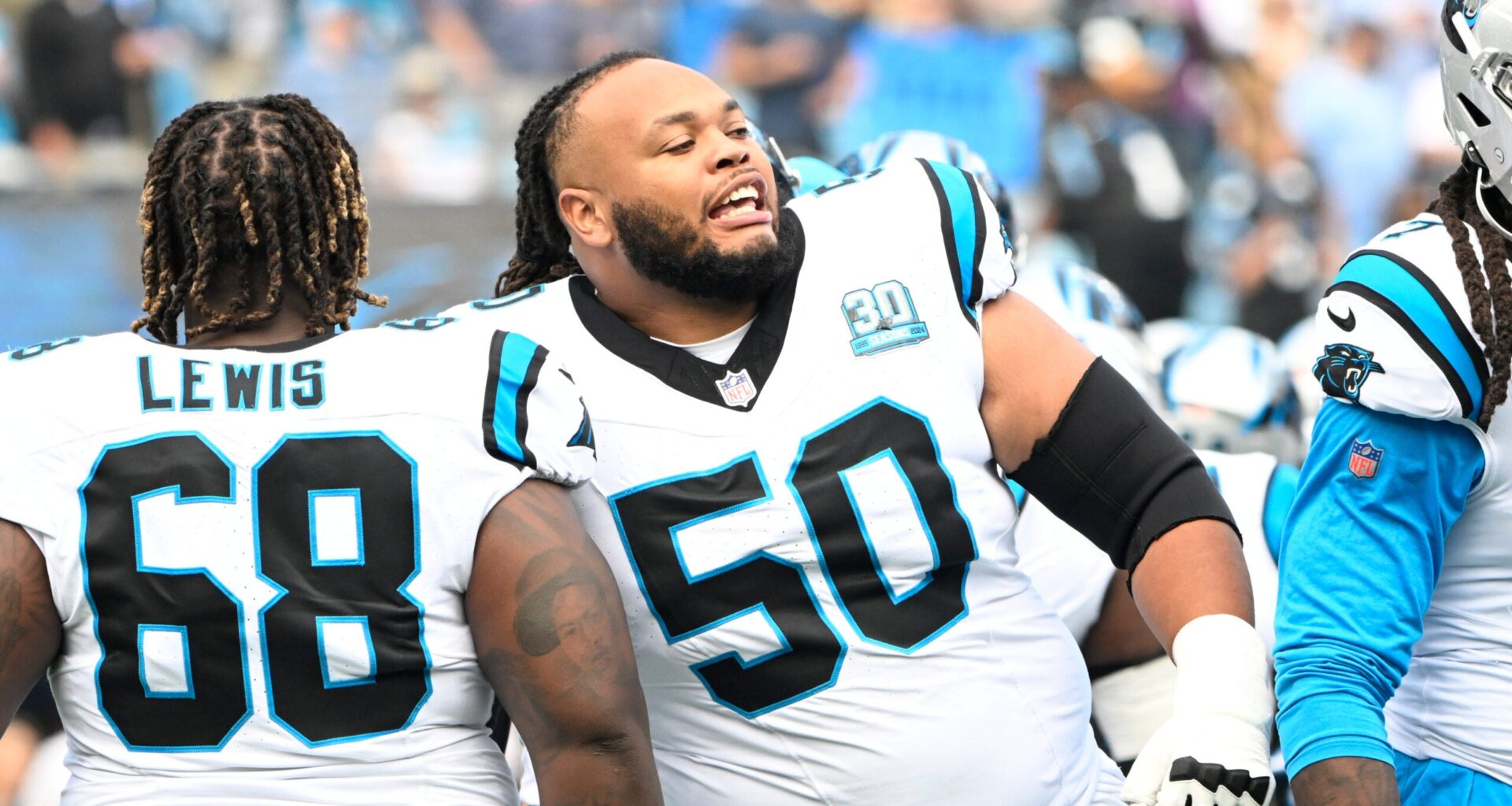 Sep 15, 2024; Charlotte, North Carolina, USA; Carolina Panthers guard Damien Lewis (68) and guard Robert Hunt (50) before the game at Bank of America Stadium.
