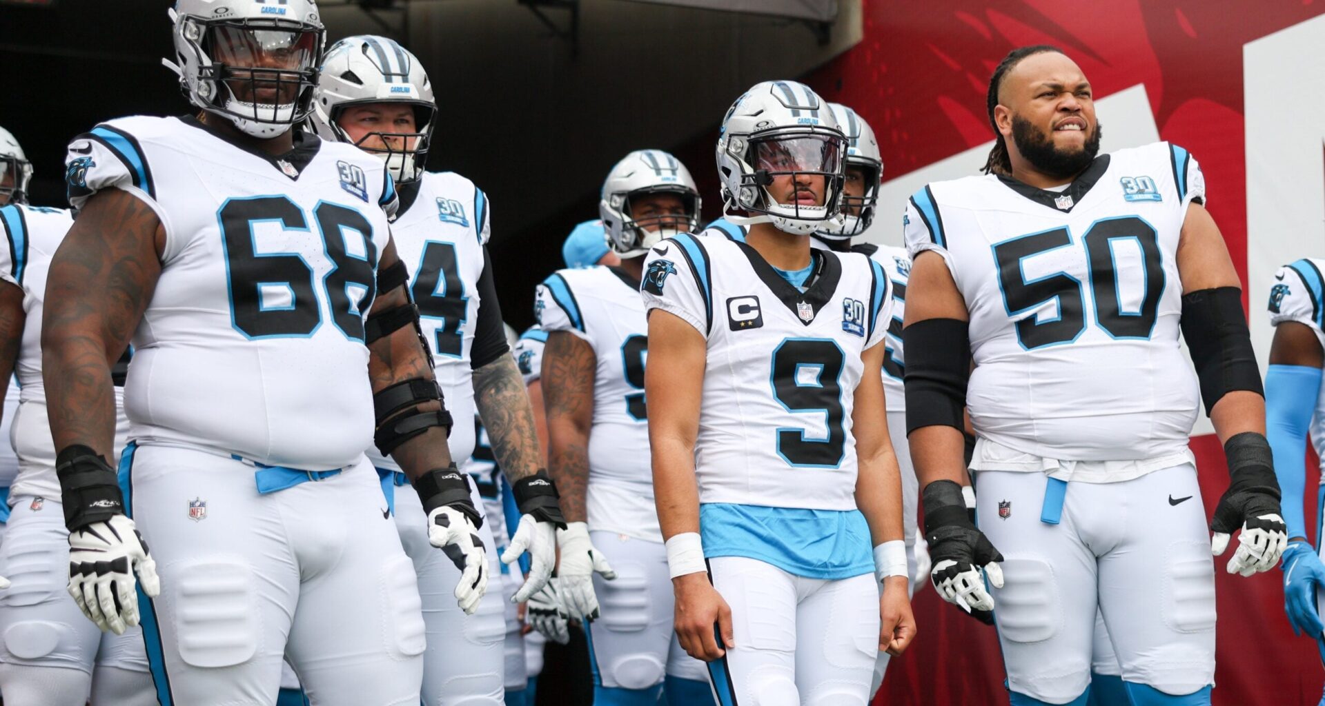 Dec 29, 2024; Tampa, Florida, USA; Carolina Panthers guard Damien Lewis (68) quarterback Bryce Young (9), and guard Robert Hunt (50) looks on before a game against the Tampa Bay Buccaneers at Raymond James Stadium.