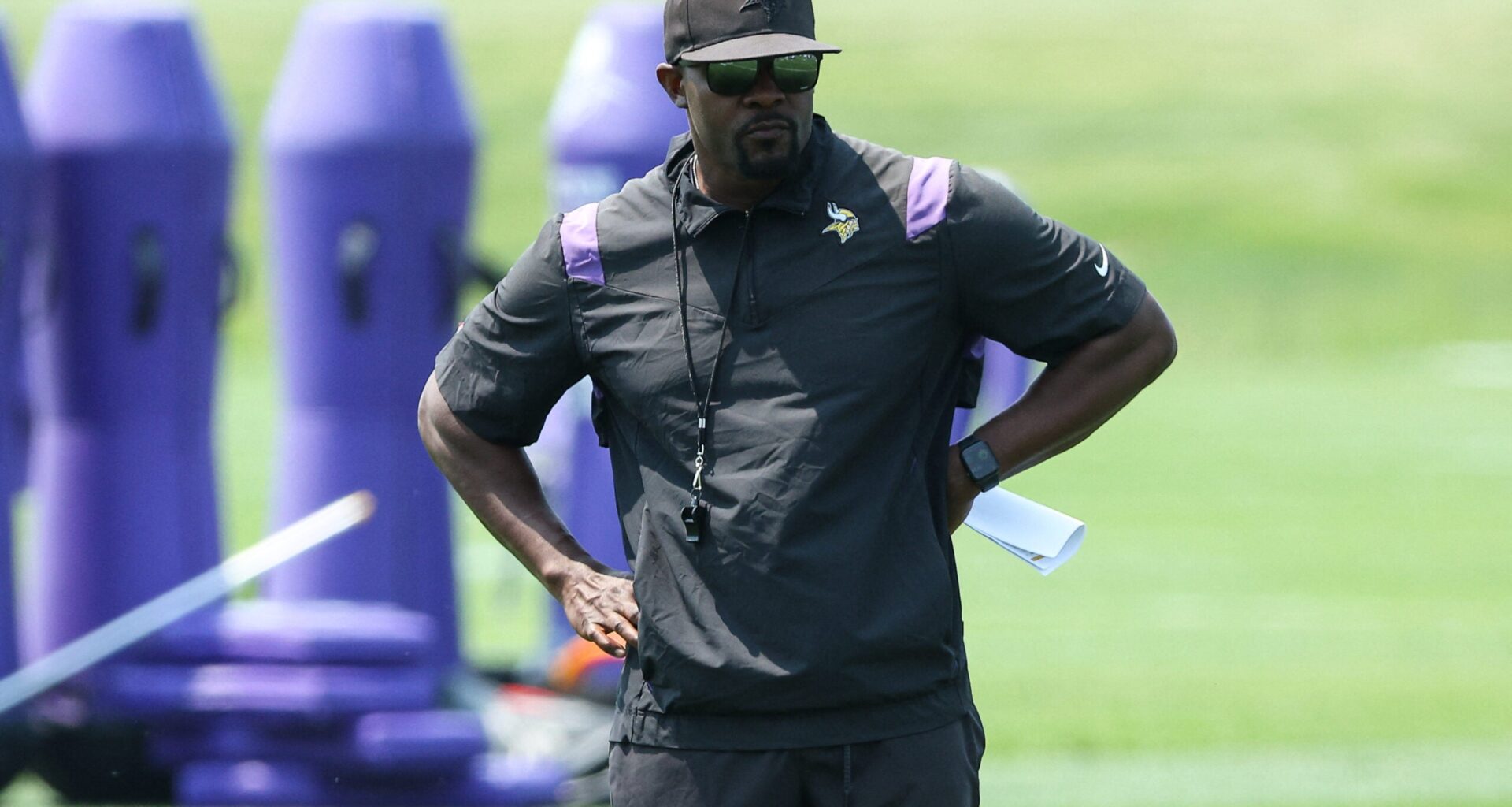 Jun 10, 2025; Minneapolis, MN, USA; Minnesota Vikings defensive coordinator Brian Flores watches practices during minicamp at the Minnesota Vikings Training Facility.