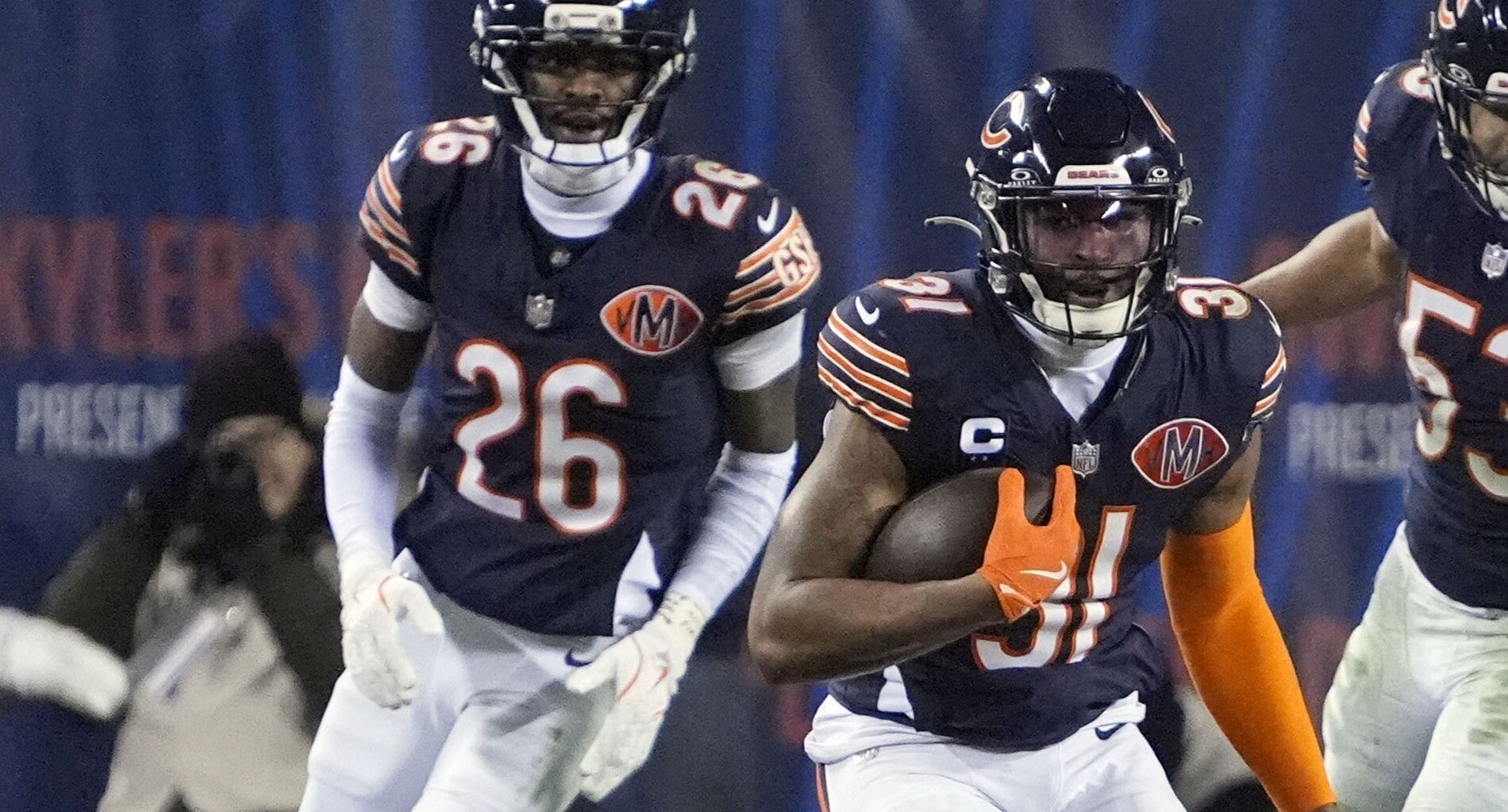 Jan 4, 2026; Chicago, Illinois, USA; Chicago Bears safety Kevin Byard III (31) runs with the ball after making an interception against the Detroit Lions during the second half at Soldier Field.