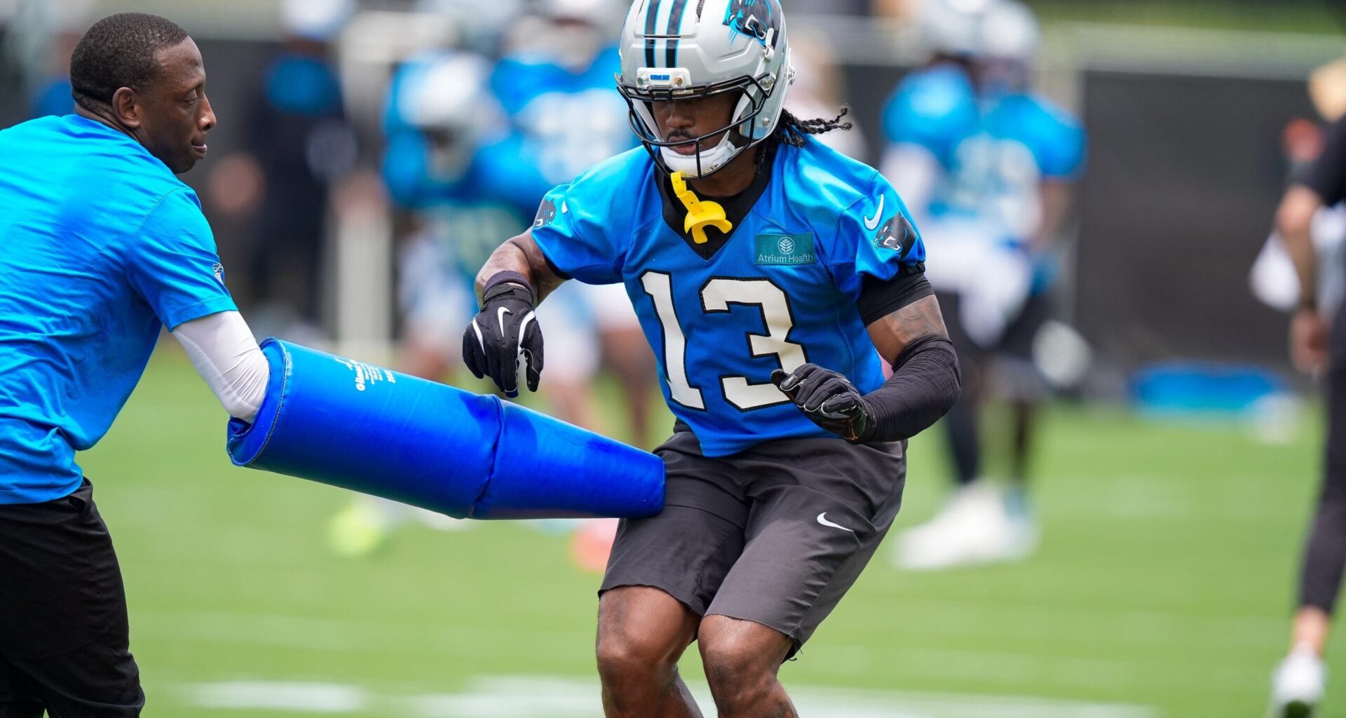 Jun 9, 2026; Charlotte, NC, USA; Carolina Panthers wide receiver John Metchie III (13) practices and avoidance drill during the first day of mini camp at Bank of America Stadium practice facility.