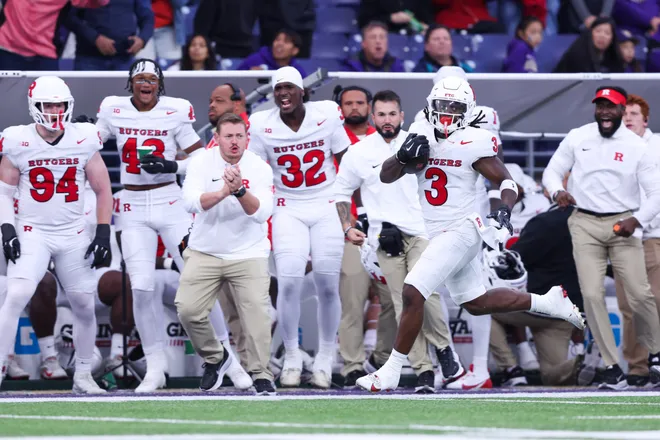 Oct 10, 2025; Seattle, Washington, USA; Rutgers Scarlet Knights running back Antwan Raymond (3) runs the ball during the first half against the Washington Huskies at Husky Stadium. Mandatory Credit: Kevin Ng-Imagn Images