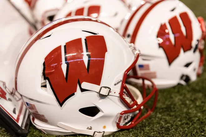 Oct 6, 2018; Madison, WI, USA; Wisconsin Badgers helmets sit on the sidelines during the game against the Nebraska Cornhuskers at Camp Randall Stadium. Mandatory Credit: Jeff Hanisch-USA TODAY Sports