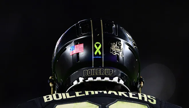 Oct 18, 2024; West Lafayette, Indiana, USA; A Purdue Boilermakers helmet with a Cancer sticker on the back for breast cancer awareness month and the hammer down cancer game against the Oregon Ducks at Ross-Ade Stadium. Mandatory Credit: Marc Lebryk-Imagn Images