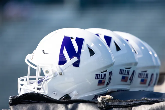 Aug 30, 2025; New Orleans, Louisiana, USA; Detailed view of the Northwestern Wildcats helmet during warmups before the game against Tulane Green Wave at Yulman Stadium. Mandatory Credit: Stephen Lew-Imagn Images