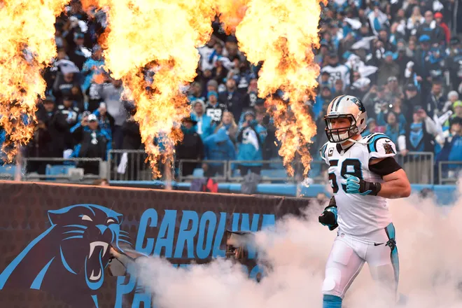 Jan 17, 2016; Charlotte, NC, USA; Carolina Panthers middle linebacker Luke Kuechly (59) is introduced before a NFC Divisional round playoff game at Bank of America Stadium. Mandatory Credit: Bob Donnan-USA TODAY Sports