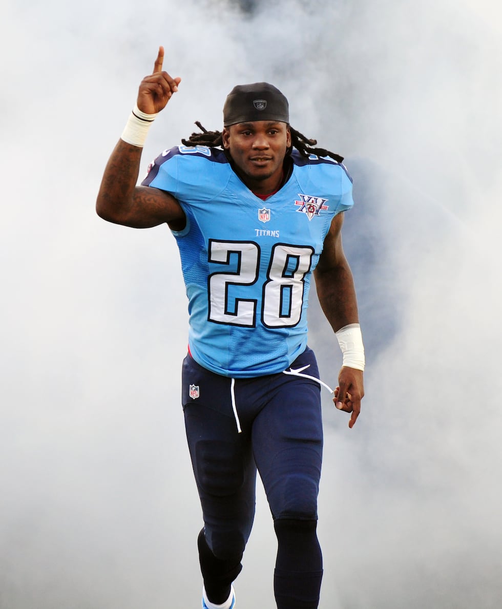 Aug 24, 2013; Nashville, TN, USA; Tennessee Titans running back Chris Johnson (28) is...