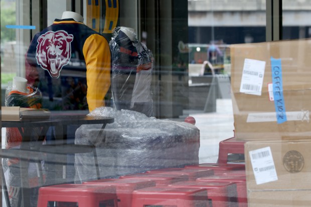 A Chicago Bears jacket and clothing inside a building near the set of a Bears-themed Hallmark holiday movie on July 9, 2026. (Antonio Perez/Chicago Tribune)