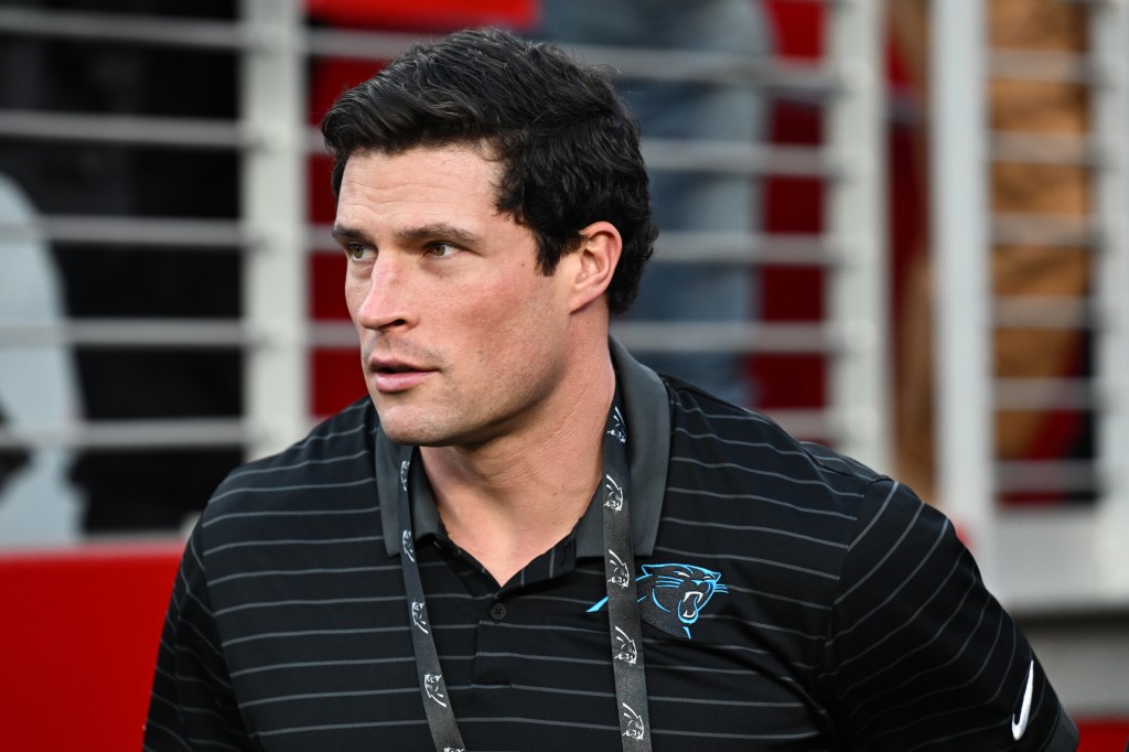Luke Kuechly looks on before the game between the San Francisco 49ers and Carolina Panthers at Levi's Stadium on November 24, 2025 in Santa Clara, California. 