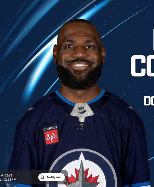 LeBron James wearing a Winnipeg Jets hockey jersey.