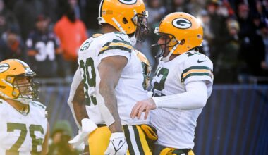 Dec 4, 2022; Chicago, Illinois, USA; Green Bay Packers tight end Marcedes Lewis (89) celebrates with quarterback Aaron Rodgers (12) after Lewis scored a touchdown against the Chicago Bears during the second half at Soldier Field.