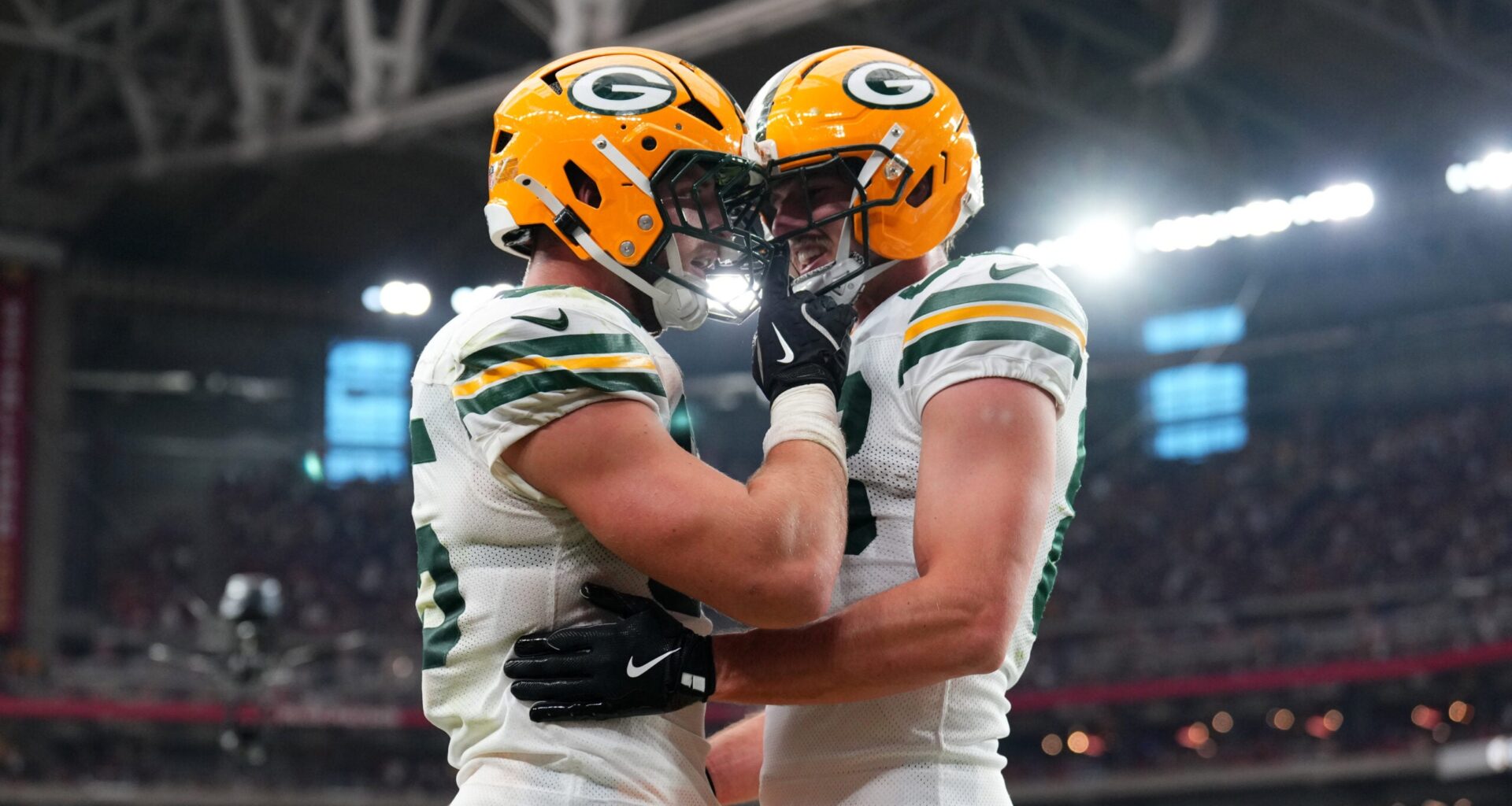 Oct 19, 2025; Glendale, Arizona, USA; Green Bay Packers tight end Tucker Kraft (85) celebrates a touchdown against the Arizona Cardinals with Green Bay Packers tight end Luke Musgrave (88) during the second half against the Arizona Cardinals at State Farm Stadium.
