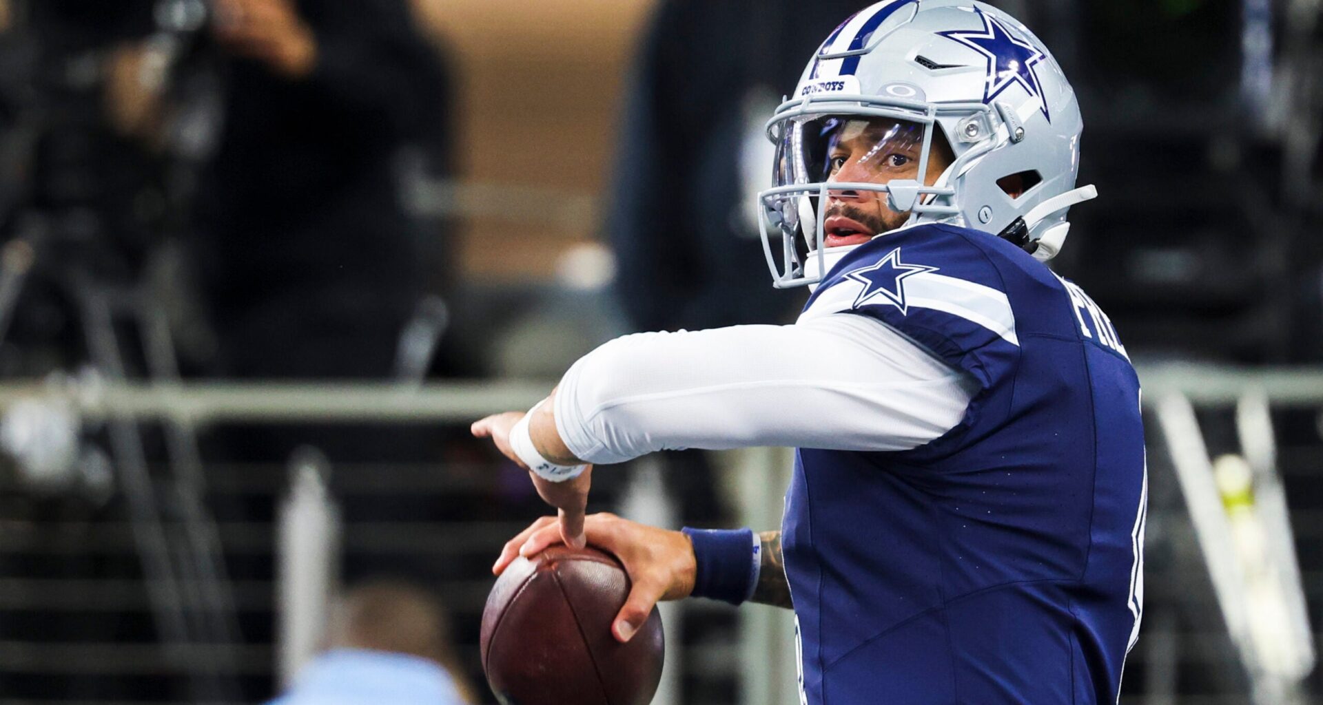 Dec 21, 2025; Arlington, Texas, USA; Dallas Cowboys quarterback Dak Prescott (4) participates in pregame warmups against the Los Angeles Chargers at AT&T Stadium.