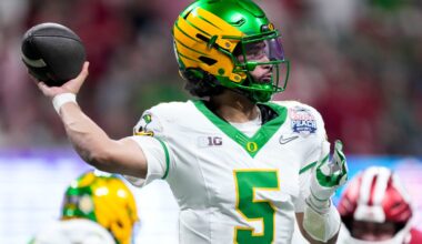Oregon Ducks quarterback Dante Moore (5) draws back to pass Friday, Jan. 9, 2026, during the Peach Bowl and semifinal game of the College Football Playoff against the Indiana Hoosiers at Mercedes-Benz Stadium in Atlanta.