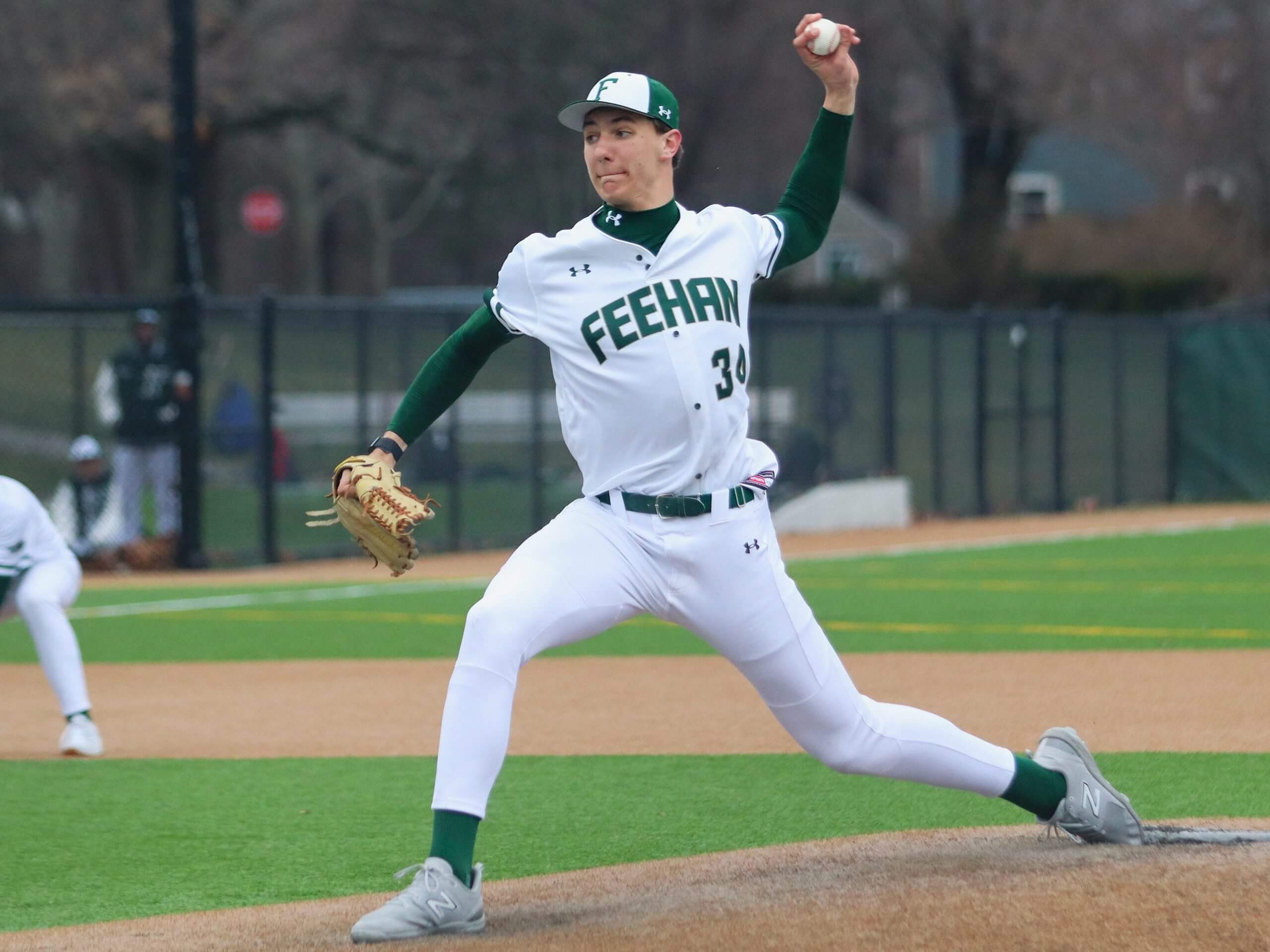 Bishop Feehan's Brody Bumila, a Raynham resident, tosses a pitch during a non-league game against Hopkinton on April 2, 2026. ©