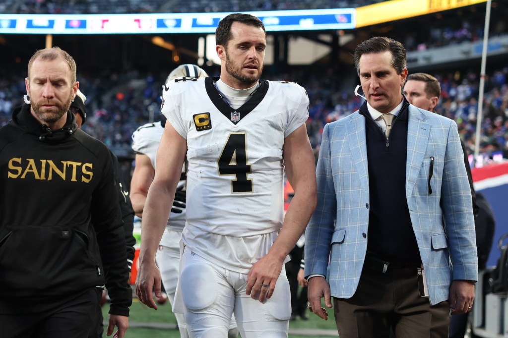 New Orleans Saints quarterback Derek Carr walking off the field.