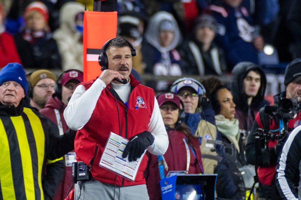 Head coach Mike Vrabel of the New England Patriots on the sideline during a game.