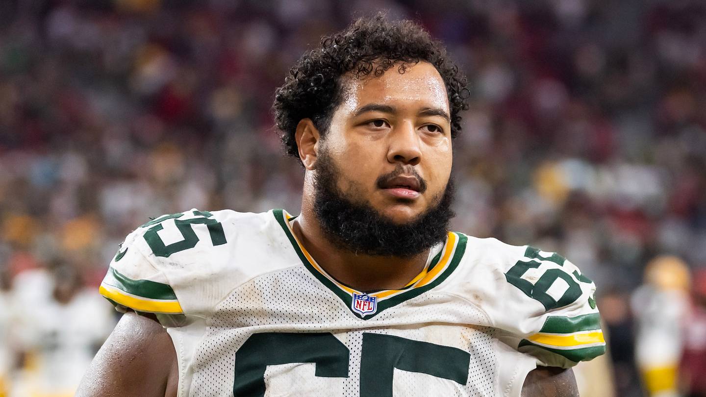 Green Bay Packers guard Aaron Banks (65) looks on