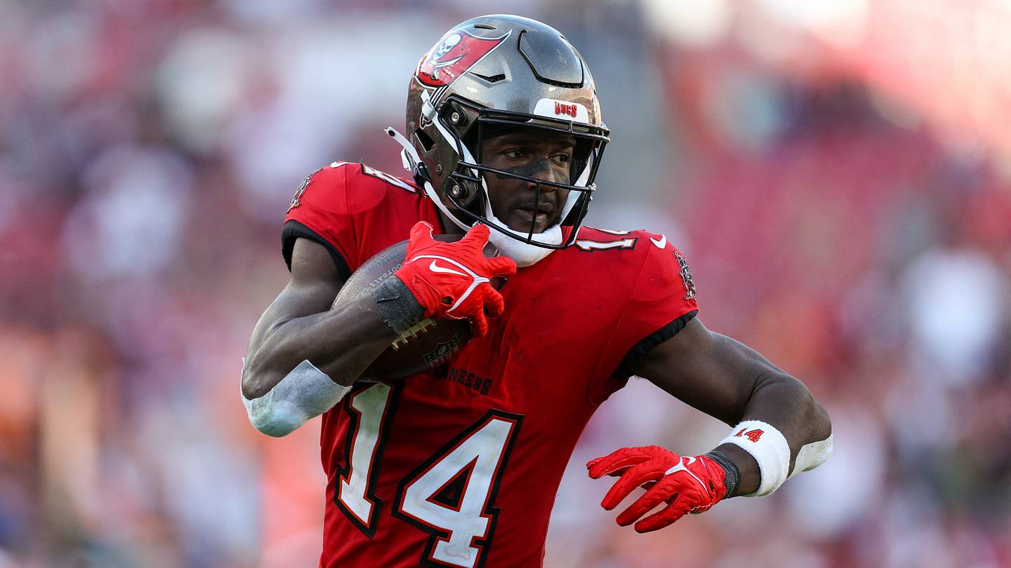 Dec 31, 2023; Tampa, Florida, USA;  Tampa Bay Buccaneers wide receiver Chris Godwin (14) catches a pass for a touchdown against the New Orleans Saints in the fourth quarter at Raymond James Stadium. Mandatory Credit: Nathan Ray Seebeck-USA TODAY Sports