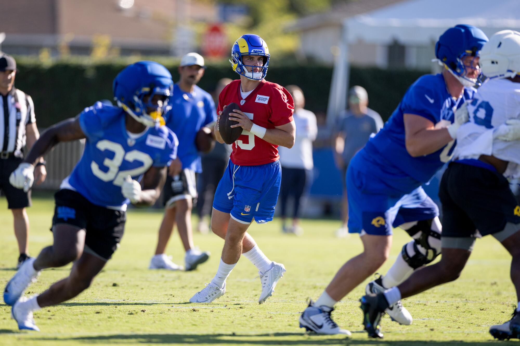 Rams quarterback Ty Simpson looks to pass during a drill in training camp at Loyola Marymount on July 27.