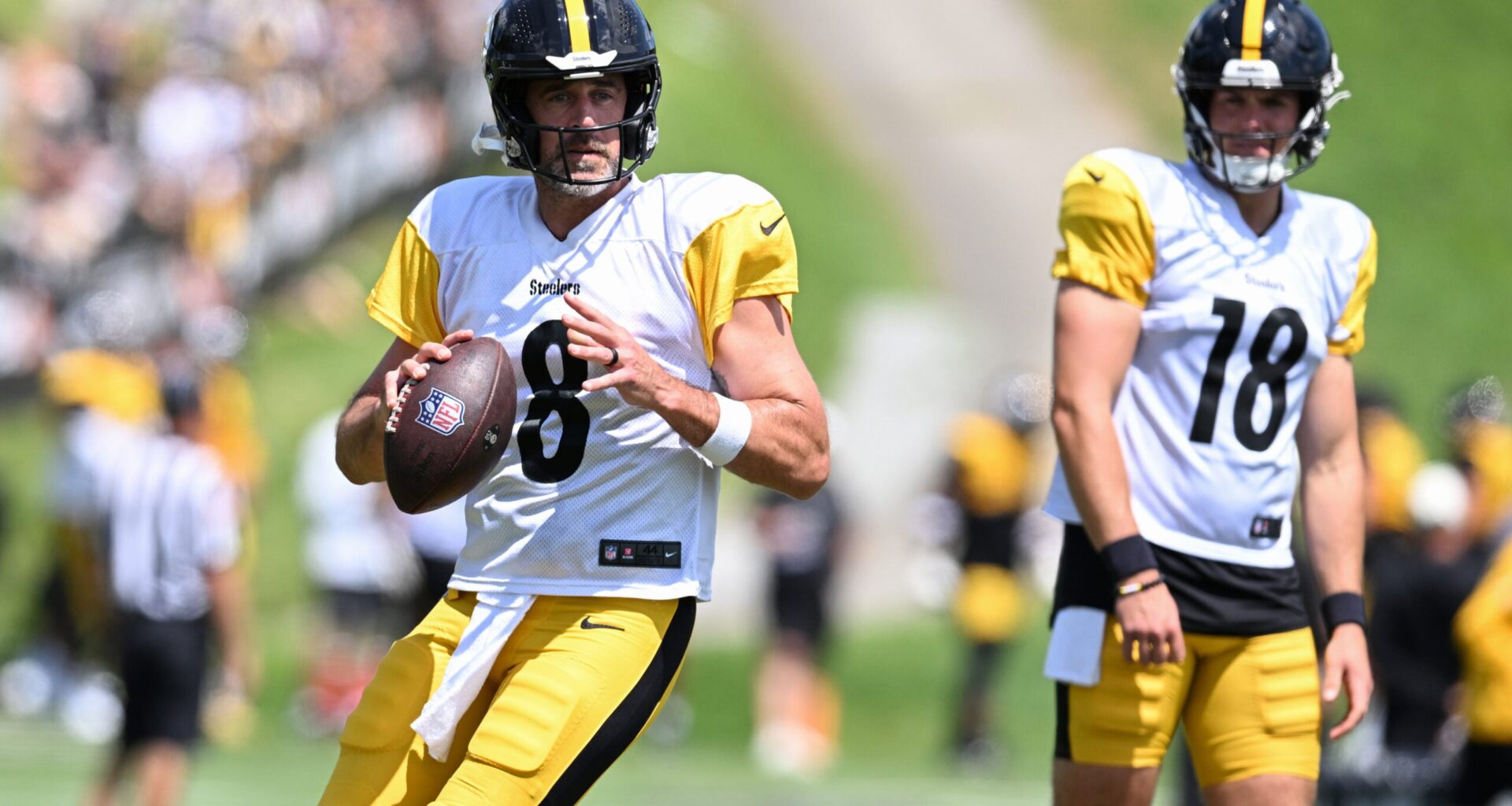 Aug 03, 2026; Latrobe, PA, USA; Pittsburgh Steelers quarterbacks Aaron Rodgers (8) looks to throw a pass as Will Howard (18) watches during a practice session at Training camp at Saint Vincent College.