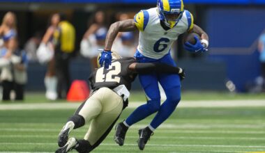Aug 22, 2026; Inglewood, California, USA; Los Angeles Rams wide receiver CJ Daniels (6) carries the ball against 42 in the first half at SoFi Stadium.
