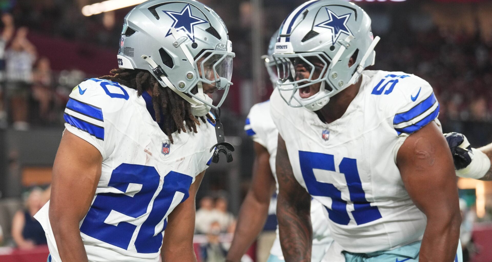Aug 22, 2026; Glendale, Arizona, USA; Dallas Cowboys running back Malik Davis (20) celebrates his touchdown with Dallas Cowboys guard Nick Leverett (51) against the Arizona Cardinals during the first half at State Farm Stadium.