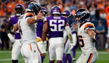 Aug 28, 2026; Denver, Colorado, USA; Denver Broncos quarterback Sam Ehlinger (4) celebrates the touchdown of running back Cody Schrader (25) in the fourth quarter against the Minnesota Vikings at Empower Field at Mile High.