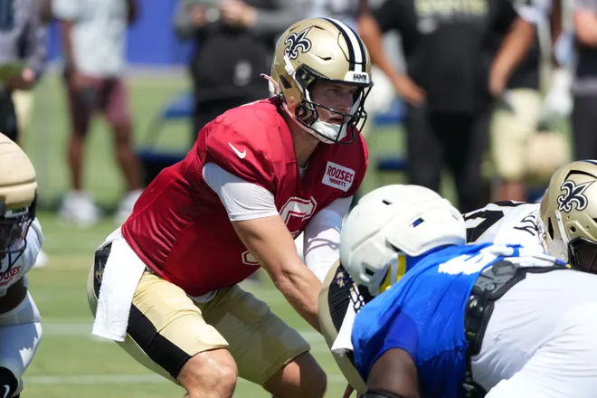 Aug 20, 2026; Woodland Hills, CA, USA; New Orleans Saints quarterback Tyler Shough (6) takes the snap against the Los Angeles Rams during a joint practice at Rams Practice Facility. Mandatory Credit: Kirby Lee-Imagn Images