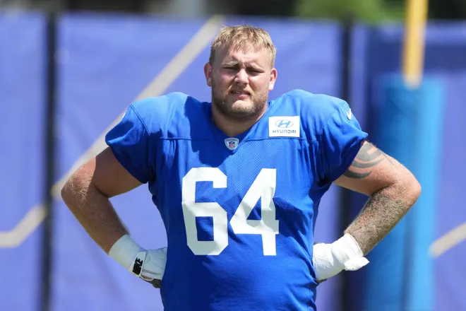 Aug 20, 2026; Woodland Hills, CA, USA; Los Angeles Rams offensive tackle Austin Blaske (64) reacts against the New Orleans Saints during a joint practice at Rams Practice Facility. Mandatory Credit: Kirby Lee-Imagn Images