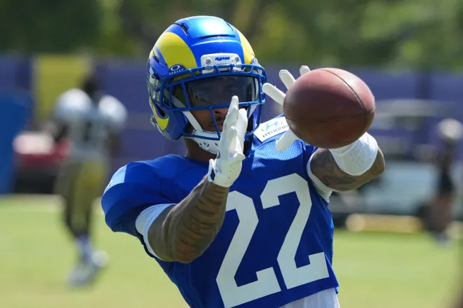Aug 20, 2026; Woodland Hills, CA, USA; Los Angeles Rams cornerback Trent McDuffie (22) catches the ball against the New Orleans Saints during a joint practice at Rams Practice Facility. Mandatory Credit: Kirby Lee-Imagn Images
