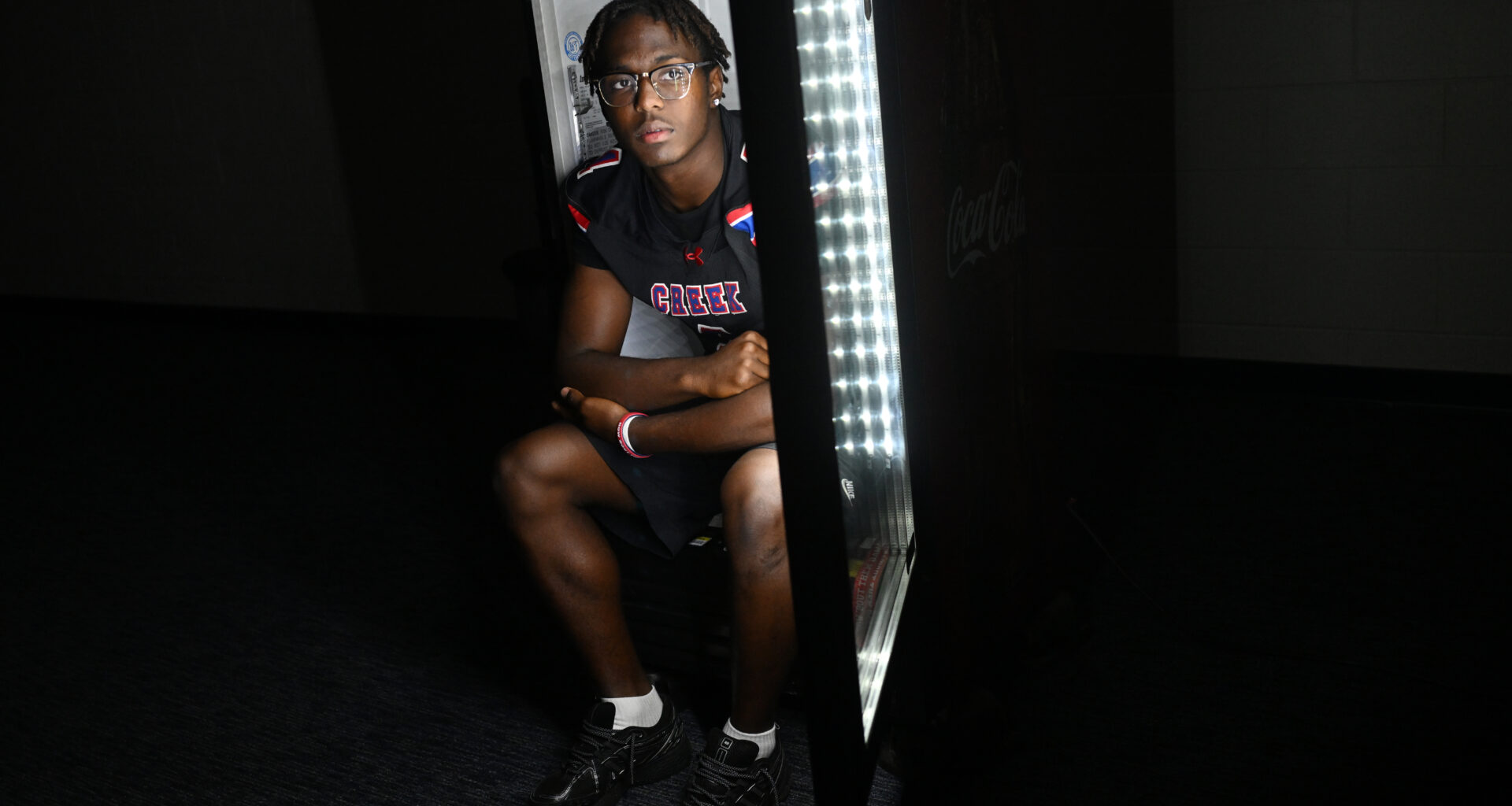 Cherry Creek's Elijah Cromwell runs with Broncos' Jaleel McLaughlin