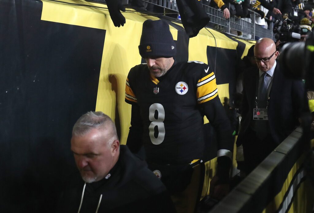 Pittsburgh Steelers quarterback Aaron Rodgers (8) walks into the tunnel after suffering a crushing 30-6 defeat by the Houston Texans during the NFL Wild Card game at Acrisure Stadium in Pittsburgh, PA on January 12, 2026.