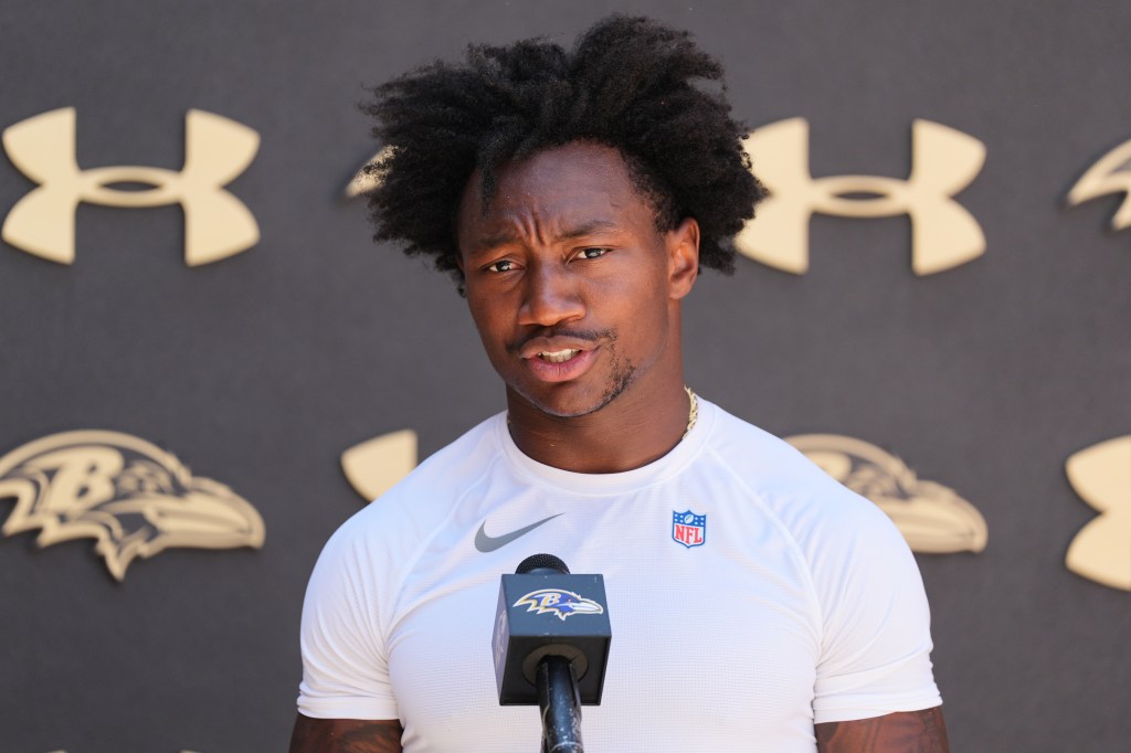 Baltimore Ravens wide receiver Zay Flowers speaks during a press conference.