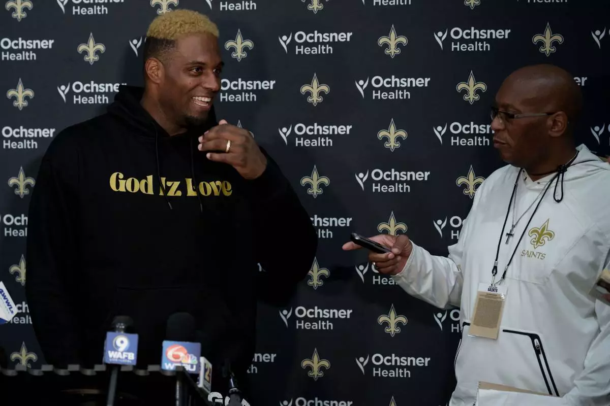 New Orleans Saints defensive end Cameron Jordan reacts during a press conference at the team's NFL football training camp in Metairie, La., Wednesday, July 29, 2026. (AP Photo/Matthew Hinton)