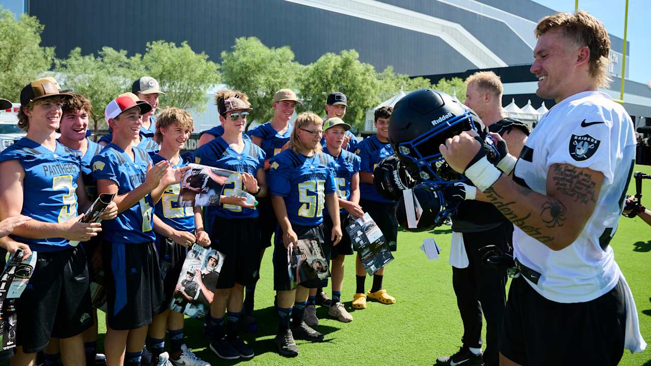 Photos: Raiders surprise high school with new helmets