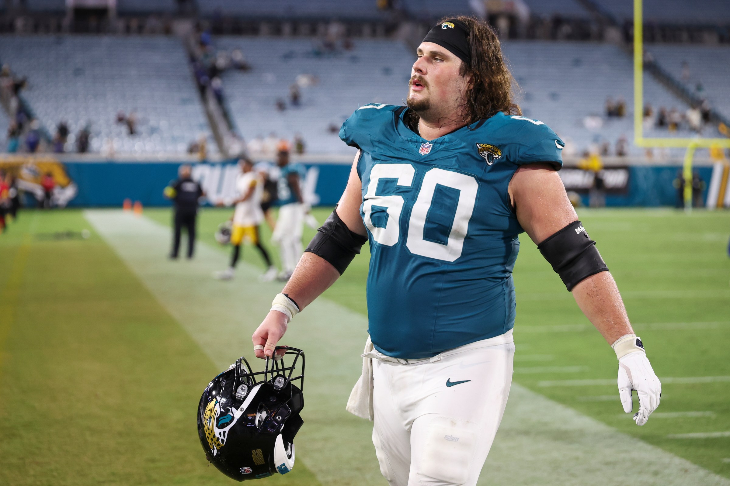 JACKSONVILLE, FLORIDA - AUGUST 9: Jonah Monheim #60 of the Jacksonville Jaguars walks off the field after a NFL Preseason 2025 game against the Pittsburgh Steelers at Everbank Stadium on August 9, 2025 in Jacksonville, Florida. (Photo by Logan Bowles/Getty Images)