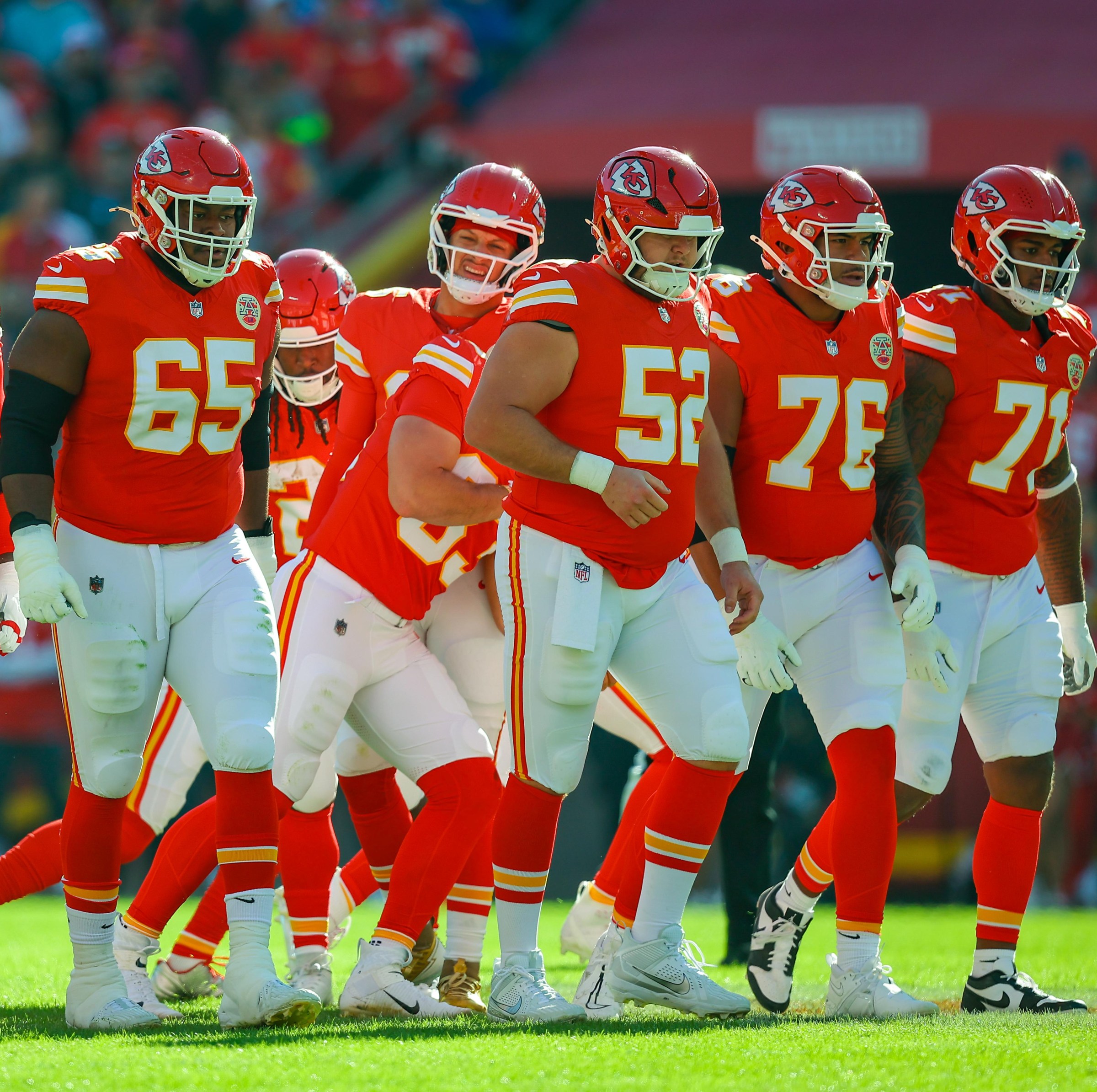 KANSAS CITY, MISSOURI - NOVEMBER 23: Travis Kelce #87 of the Kansas City Chiefs, Jawaan Taylor #74 of the Kansas City Chiefs, Trey Smith #65 of the Kansas City Chiefs, Creed Humphrey #52 of the Kansas City Chiefs, Kingsley Suamataia #76 of the Kansas City Chiefs and Josh Simmons #71 of the Kansas City Chiefs walk to the line of scrimmage in the first quarter during the NFL 2025 game between Indianapolis Colts and Kansas City Chiefs at Arrowhead Stadium on November 23, 2025 in Kansas City, United States. (Photo by David Eulitt/Getty Images)