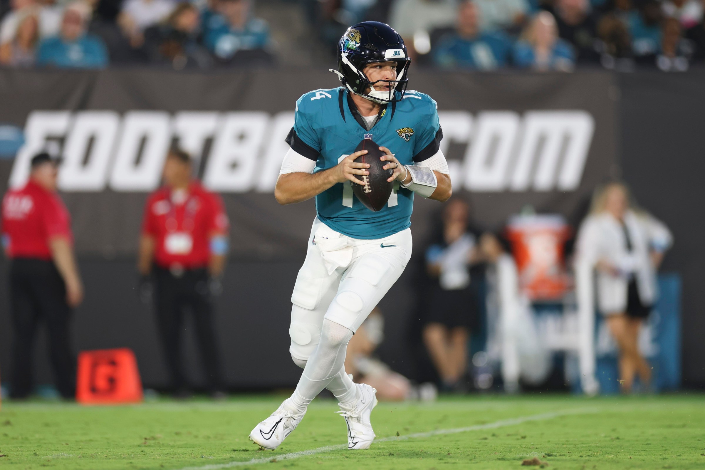 JACKSONVILLE, FLORIDA - AUGUST 21: Nick Mullens #14 of the Jacksonville Jaguars throws a pass during a preseason NFL football game against the Carolina Panthers at Everbank Stadium on August 21, 2026 in Jacksonville, Florida. (Photo by Logan Bowles/Getty Images)