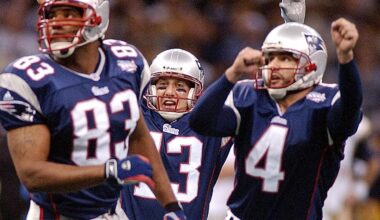 New England Patriots cornerback Ty Law (24) runs for a touchdown after intercepting a pass