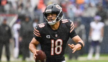 Chicago Bears quarterback Caleb Williams (18) scrambles
