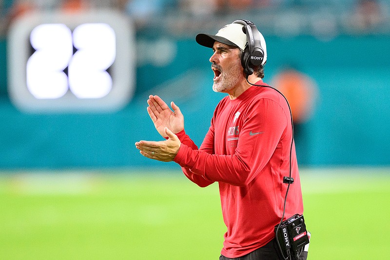 Atlanta Falcons first-year head coach Kevin Stefanski claps and shouts on the visitors' sideline at Hard Rock Stadium during a preseason exhibition game against the Miami Dolphins on Aug. 28 in Miami Gardens, Fla. (AP Photo/Doug Murray)