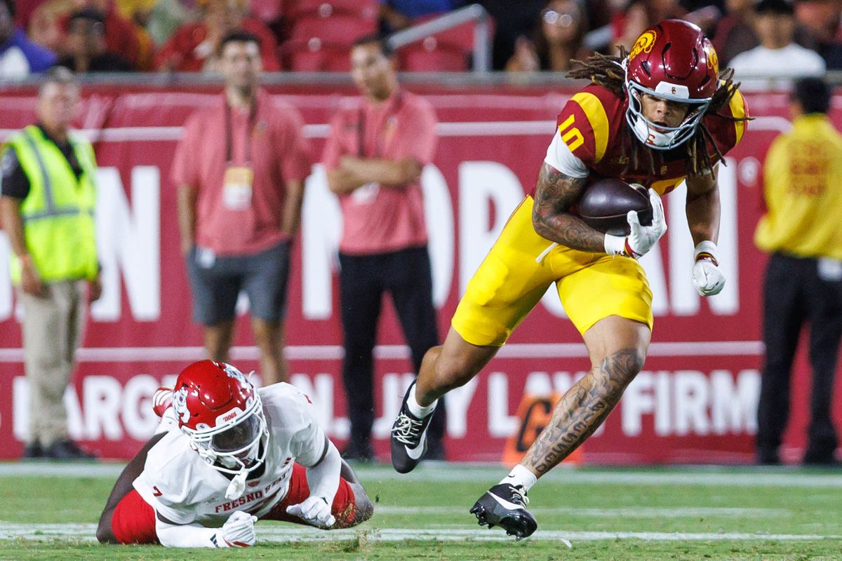 Corey Simms #10 of the USC Trojans evades a tackle during an NCAA Football game against the Fresno State Bulldogs on September 4, 2026 at The Los Angeles Memorial Coliseum in Los Angeles, California.