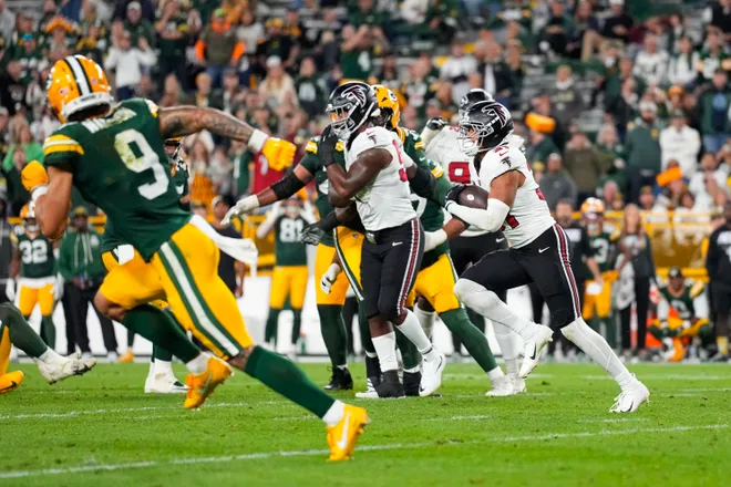 Sep 24, 2026; Green Bay, Wisconsin, USA; Atlanta Falcons safety Xavier Watts (31) returns an interception during the fourth quarter against the Green Bay Packers at Lambeau Field. Mandatory Credit: Jeff Hanisch-Imagn Images